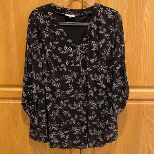 Black blouse with leafy flowers